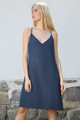 Sleeveless shift dress with halterneck and ties at back